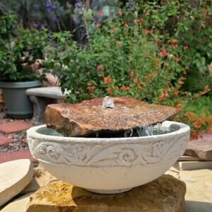 Hand-Carved Serenity: The Artisanal Stone Bird Bat